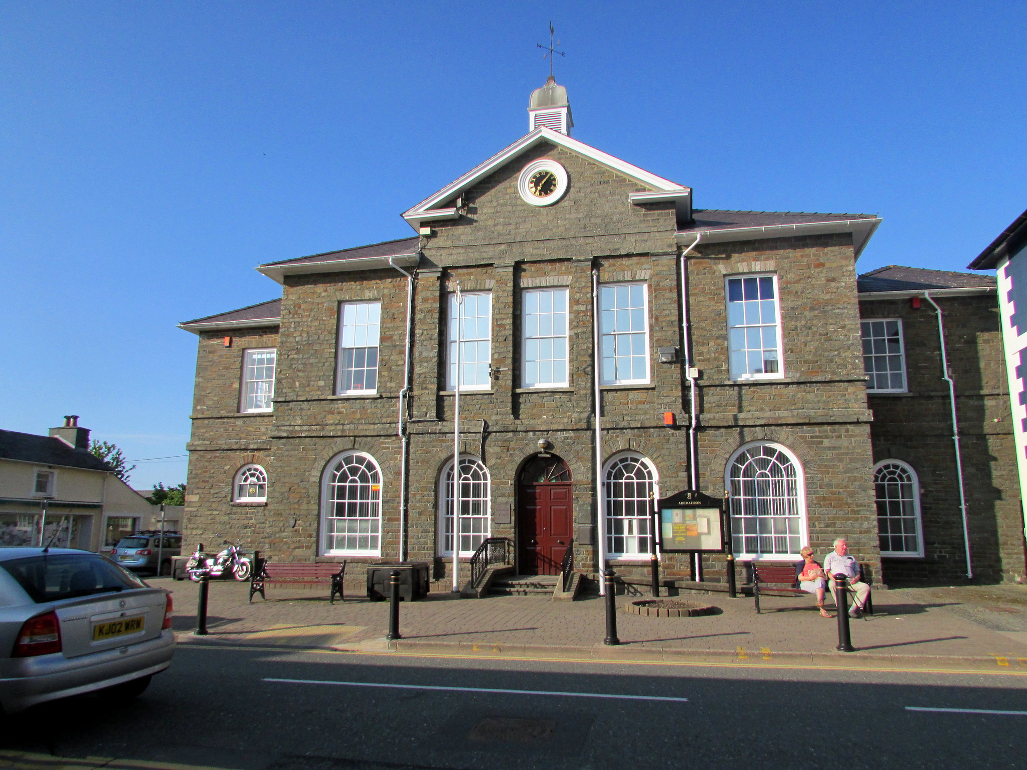 "Aberaeron Town Hall" by Reading Tom is licensed under CC BY 2.0. To view a copy of this license, visit https://creativecommons.org/licenses/by/2.0/?ref=openverse.